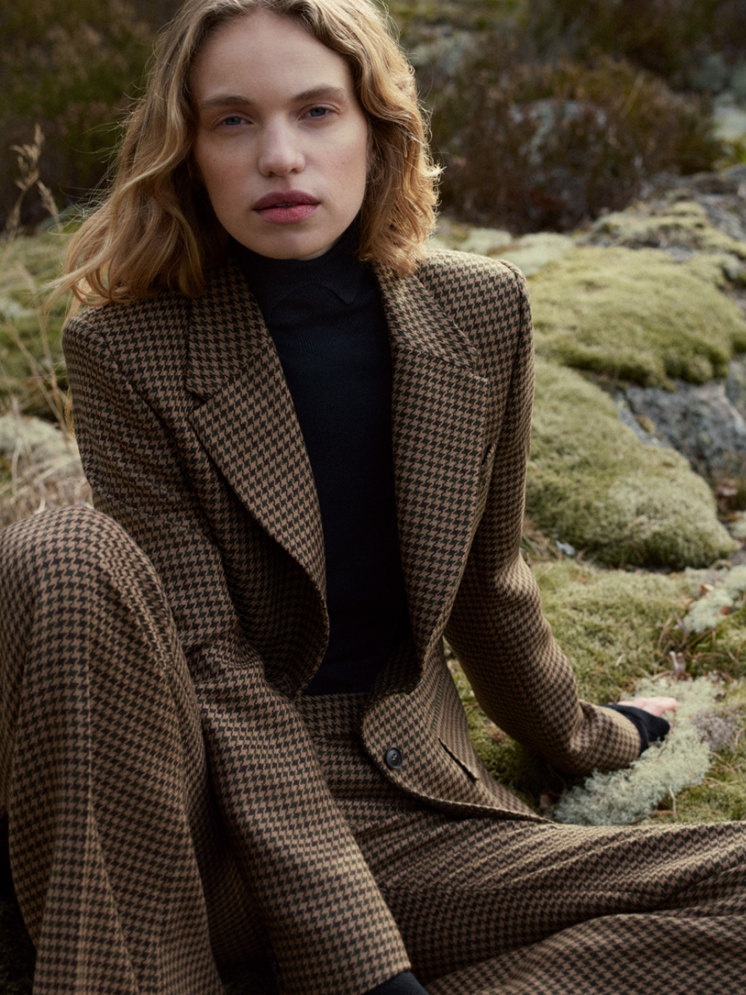 women in matching suit